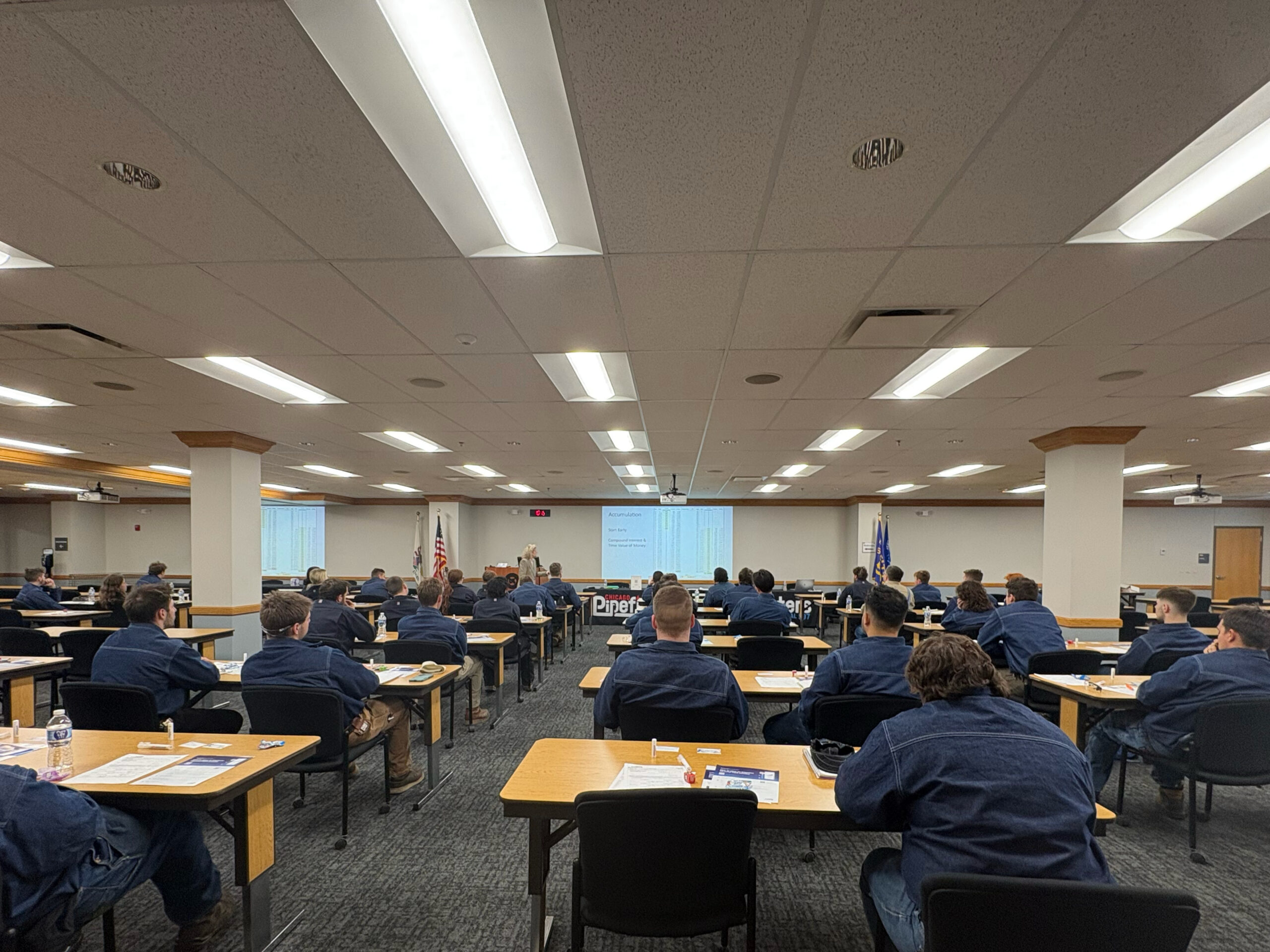 Jennifer Yeaton, owner of Integrate Solutions Group, LLC (ISG LLC), teaching a retirement benefits seminar for Chicago Pipefitters Local 597.